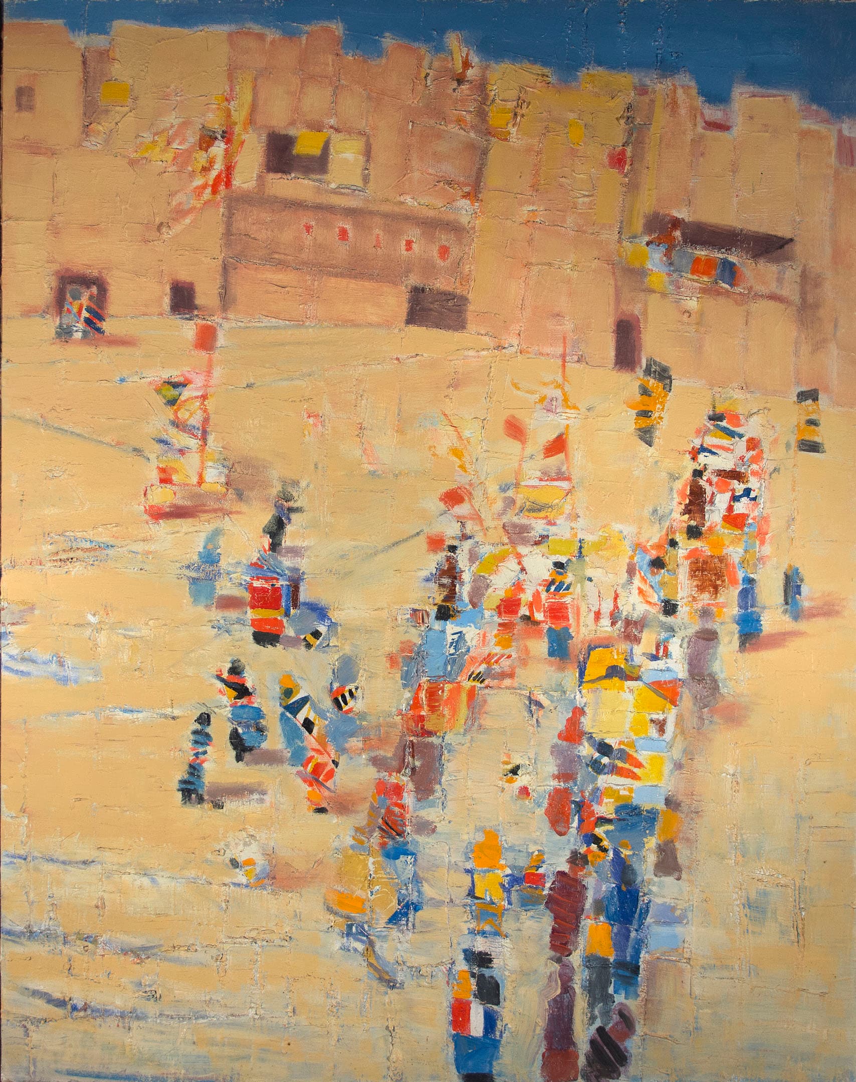 An abstract painting featuring a sandy landscape with vibrant, irregular shapes and colors depicting figures and structures. Dominant hues of beige and earthy tones are contrasted by splashes of red, blue, yellow, and black. A blue sky is visible at the top, while the background suggests a stylized architectural feature resembling a fortified wall or building.