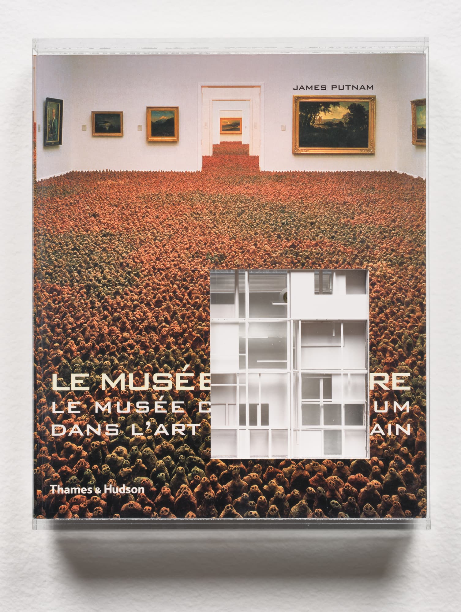 The image features the cover of a book titled "Le Musée de l’Art Contemporain," authored by James Putnam. The background displays a digitally manipulated gallery scene with paintings on the walls and a floor covered in a dense pattern resembling human figures. A transparent cut-out reveals a minimalist architectural design against the vibrant background. The title and author's name are prominently displayed in white text. The overall composition conveys a blend of traditional art gallery aesthetics with contemporary visual elements.